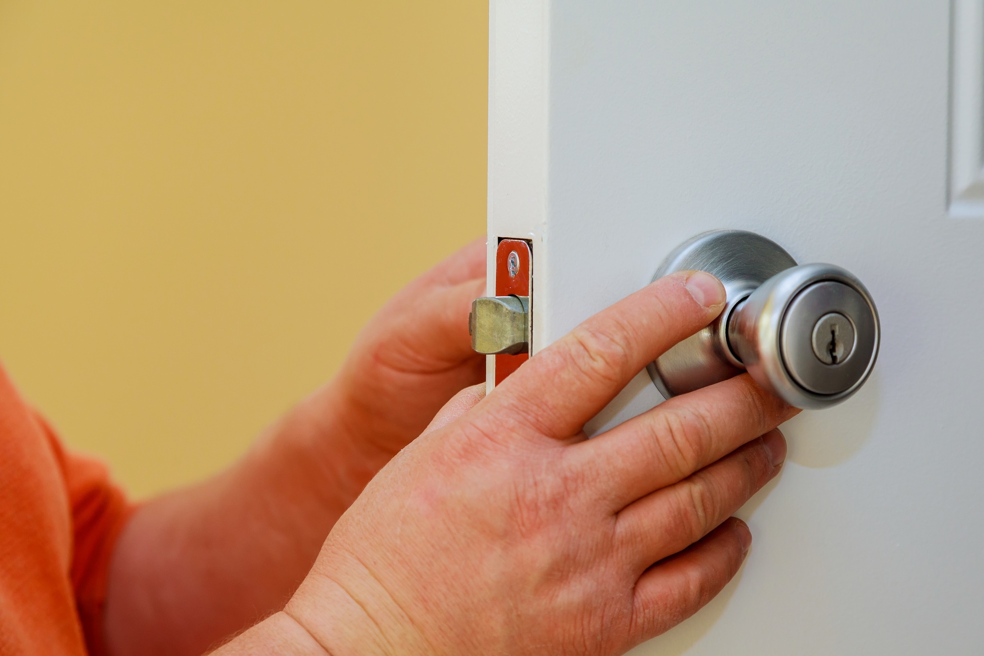 Installation of the door lock. installation of a lock at the door
